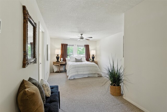 4857 Yucca St, Los Alamos, NM 87544 - bedroom with carpet flooring, a textured ceiling, and ceiling fan