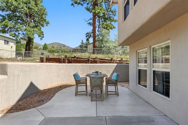 4857 Yucca St, Los Alamos, NM 87544 - view of patio / terrace featuring outdoor dining space and a mountain view