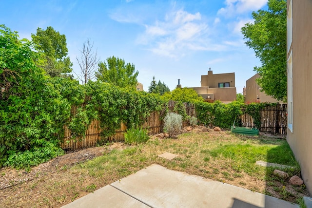 4485 Dancing Ground Rd, Santa Fe, NM 87507 - fenced backyard with a patio