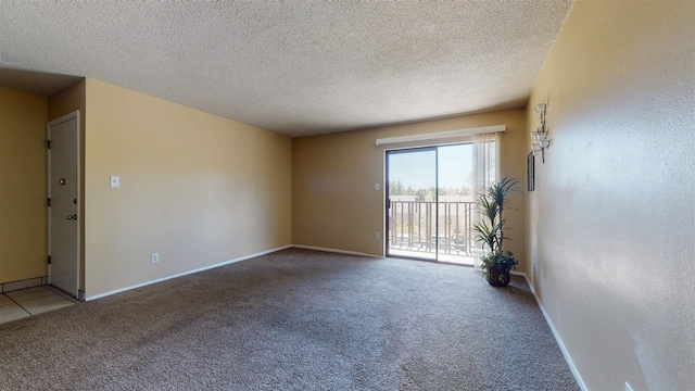 3055 Trinity Dr Unit 517, Los Alamos, NM 87544 - unfurnished room featuring light colored carpet and a textured ceiling