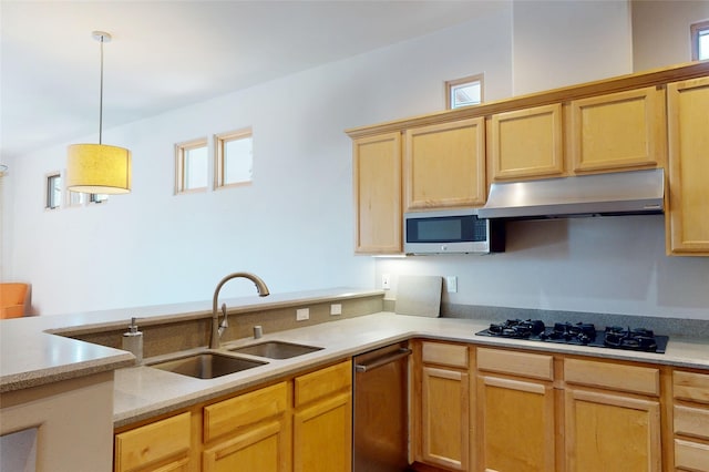 5045 Carriage House Dr, Los Alamos, NM 87544 - kitchen featuring stainless steel appliances, under cabinet range hood, healthy amount of natural light, and light countertops