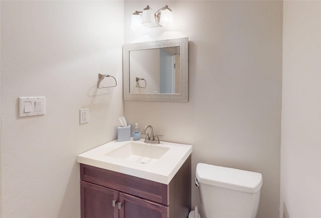 5045 Carriage House Dr, Los Alamos, NM 87544 - bathroom featuring toilet and vanity