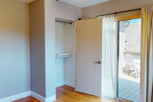 5045 Carriage House Dr, Los Alamos, NM 87544 - unfurnished bedroom with light wood-type flooring and baseboards
