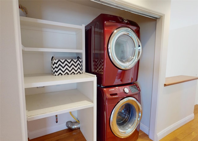 5045 Carriage House Dr, Los Alamos, NM 87544 - laundry room featuring stacked washer / dryer and wood finished floors
