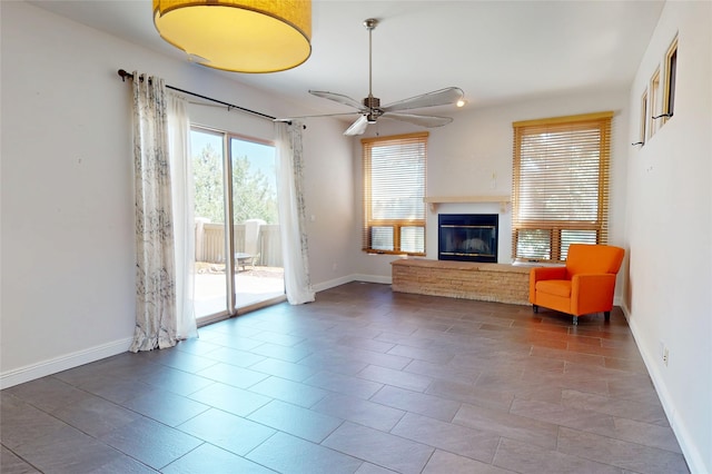 5045 Carriage House Dr, Los Alamos, NM 87544 - living area with a glass covered fireplace and a ceiling fan
