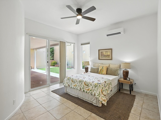 16 Coyote Pass Rd, Santa Fe, NM 87508 - tiled bedroom featuring access to outside, a wall unit AC, and a ceiling fan
