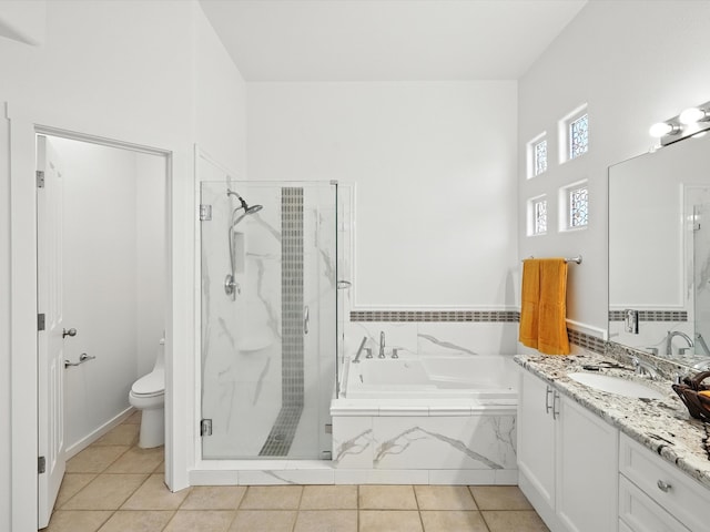 16 Coyote Pass Rd, Santa Fe, NM 87508 - full bath featuring vanity, a stall shower, a garden tub, and tile patterned floors