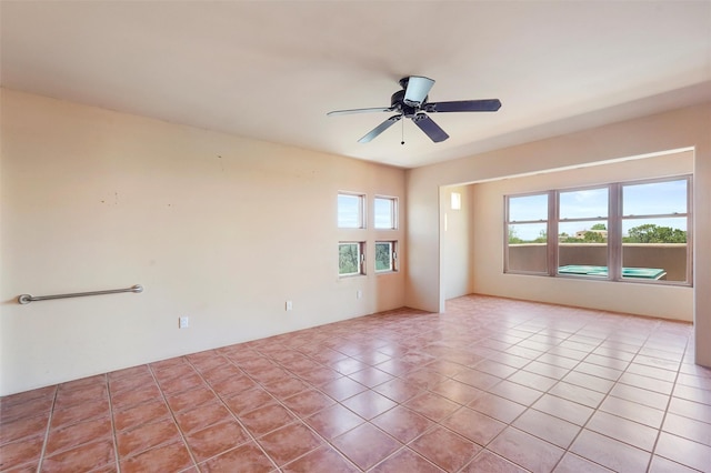 35 Avenida De La Paz, Lamy, NM 87540 - tiled empty room featuring ceiling fan