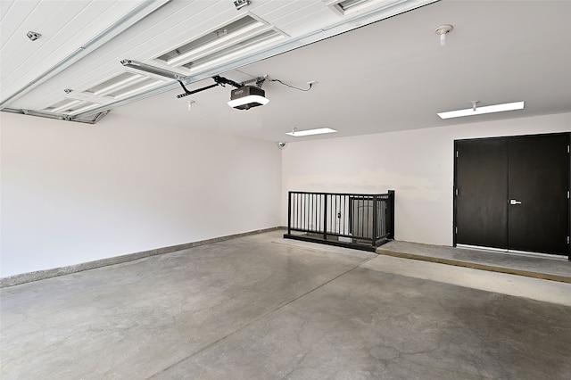 117 La Ventana, Santa Fe, NM 87508 - garage featuring a garage door opener