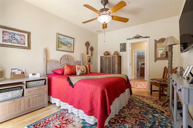 4351 San Benito Unit A, Santa Fe, NM 87507 - bedroom with light wood-style floors and ceiling fan