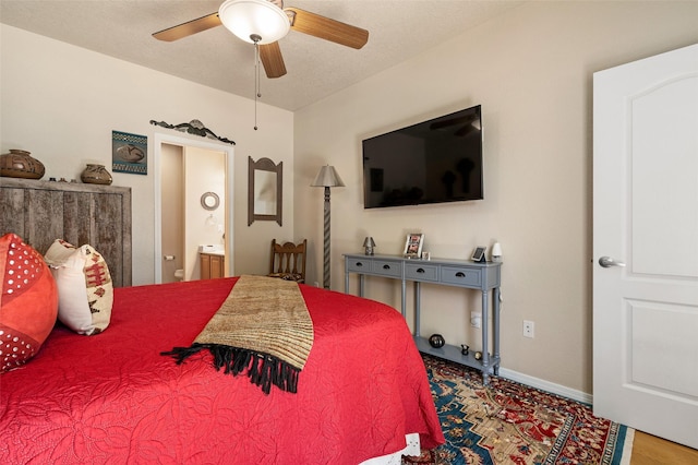 4351 San Benito Unit A, Santa Fe, NM 87507 - bedroom with ensuite bathroom and ceiling fan