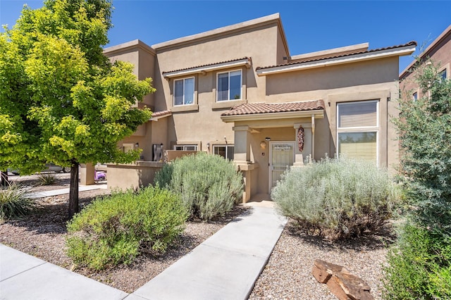 4351 San Benito Unit A, Santa Fe, NM 87507 - view of front facade featuring a tile roof and stucco siding