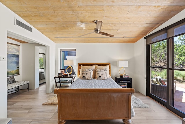 24 Whispering Spirits Dr, Cerrillos, NM 87010 - bedroom featuring wood ceiling, lofted ceiling, light wood-type flooring, and a ceiling fan
