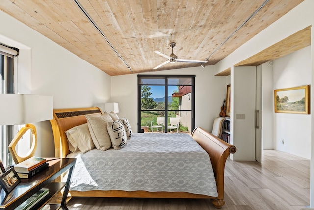 24 Whispering Spirits Dr, Cerrillos, NM 87010 - bedroom with wooden ceiling, wood finished floors, and access to outside