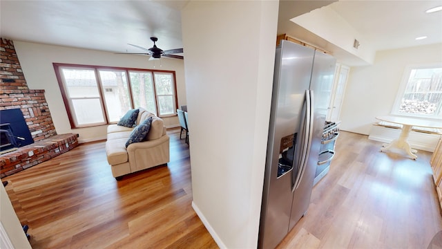 2374 36th Unit B, Los Alamos, NM 87544 - kitchen with stainless steel fridge with ice dispenser, light wood-type flooring, and healthy amount of natural light