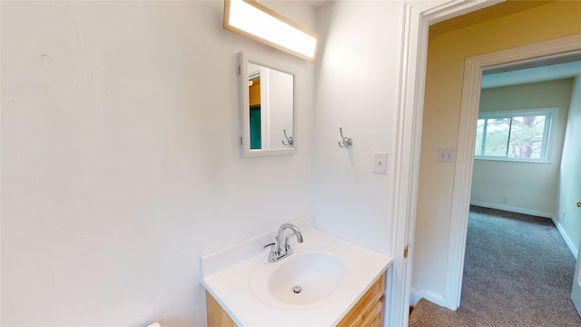 2374 36th Unit B, Los Alamos, NM 87544 - bathroom with vanity and baseboards