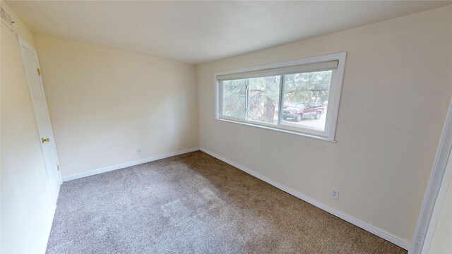 2374 36th Unit B, Los Alamos, NM 87544 - carpeted spare room featuring baseboards