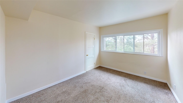 2374 36th Unit B, Los Alamos, NM 87544 - empty room with carpet floors and baseboards