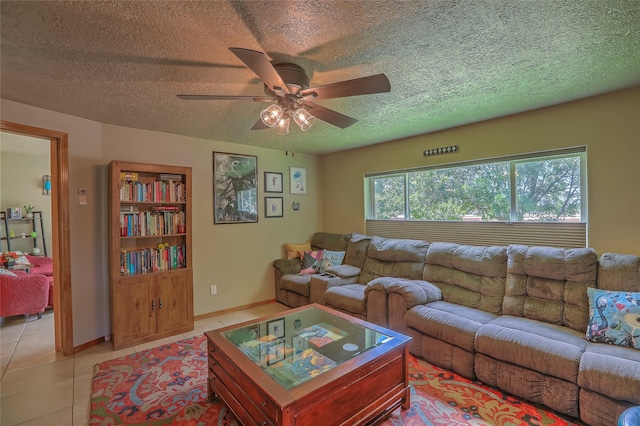 7513 Kachina Loop, Santa Fe, NM 87507 - living room featuring a textured ceiling, ceiling fan, and light tile patterned floors