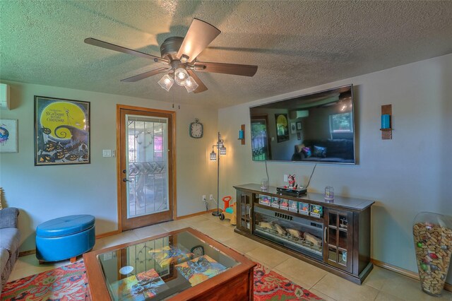 7513 Kachina Loop, Santa Fe, NM 87507 - tiled living area featuring a textured ceiling and ceiling fan