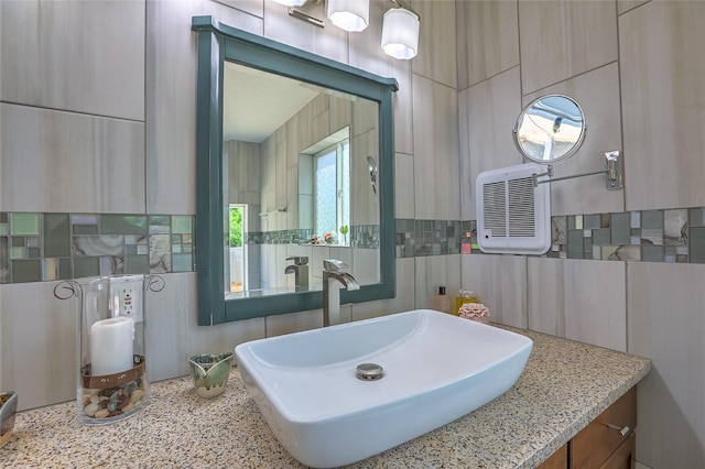 7513 Kachina Loop, Santa Fe, NM 87507 - bathroom with tasteful backsplash and vanity