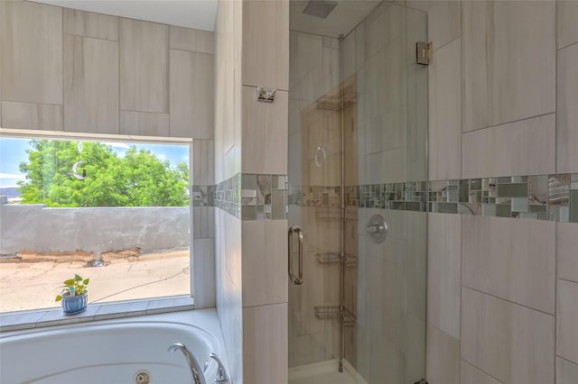 7513 Kachina Loop, Santa Fe, NM 87507 - full bathroom with a stall shower and a whirlpool tub