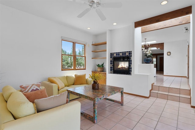 8 Antigua Ct, Santa Fe, NM 87508 - living room featuring a tile fireplace, light tile patterned flooring, ceiling fan, and recessed lighting