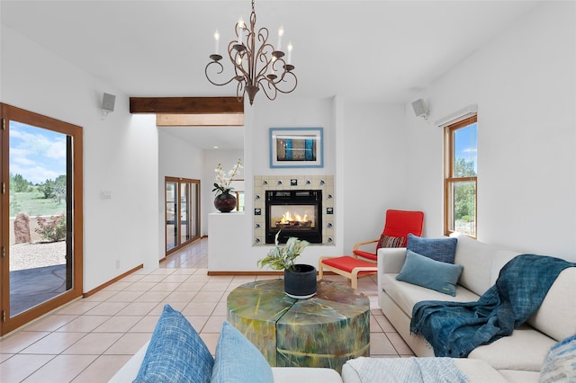 8 Antigua Ct, Santa Fe, NM 87508 - living room featuring light tile patterned floors, a chandelier, a fireplace, and beamed ceiling