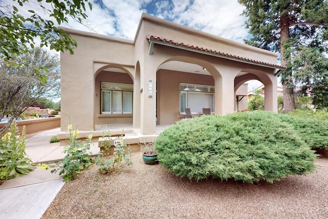 728 Don Gaspar Ave Unit 1A & 1B, Santa Fe, NM 87505 - view of front facade featuring stucco siding and covered porch