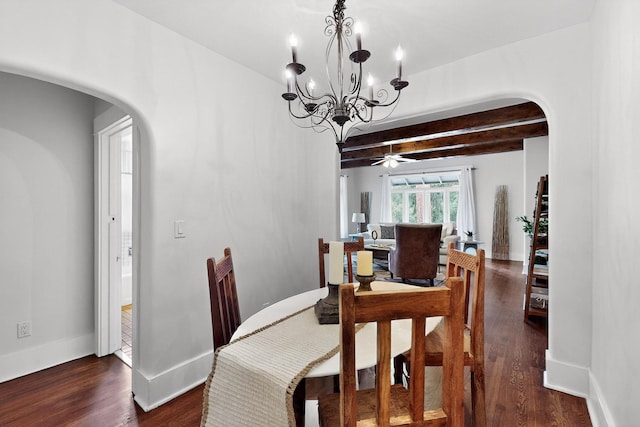 728 Don Gaspar Ave Unit 1A & 1B, Santa Fe, NM 87505 - dining space featuring arched walkways, dark wood finished floors, a chandelier, a ceiling fan, and beamed ceiling