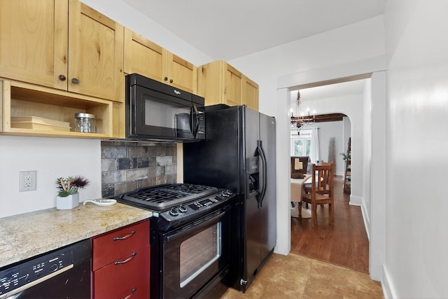 728 Don Gaspar Ave Unit 1A & 1B, Santa Fe, NM 87505 - kitchen featuring black appliances, a chandelier, backsplash, arched walkways, and light brown cabinetry