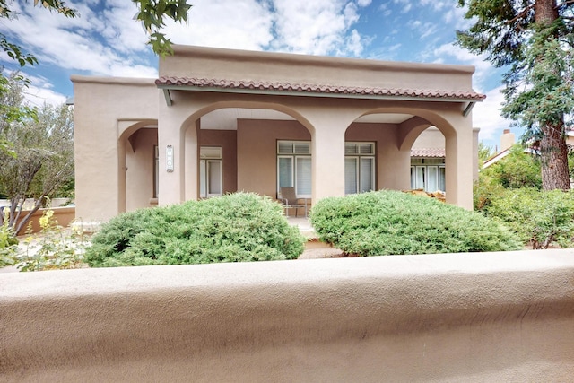 728 Don Gaspar Ave Unit 1A & 1B, Santa Fe, NM 87505 - view of home's exterior featuring stucco siding