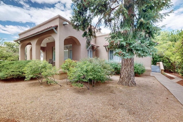728 Don Gaspar Ave Unit 1A & 1B, Santa Fe, NM 87505 - view of front of home with stucco siding and a tile roof