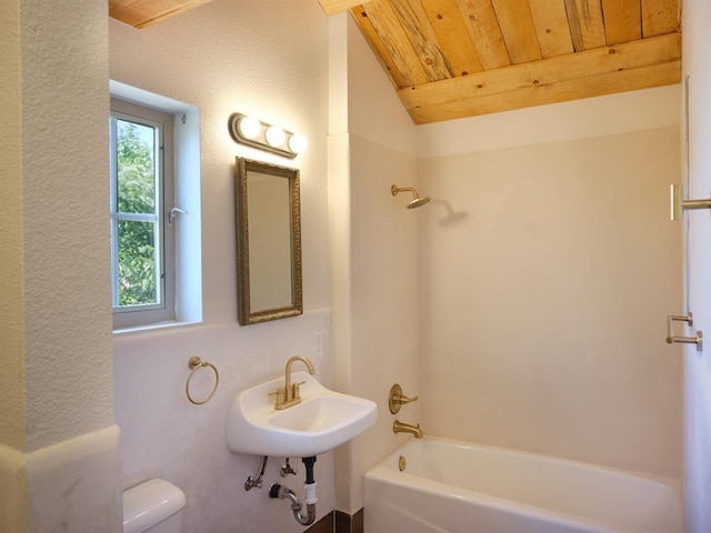 1918 Hopewell Unit C, Santa Fe, NM 87505 - full bath featuring washtub / shower combination, vaulted ceiling, wooden ceiling, and a textured wall