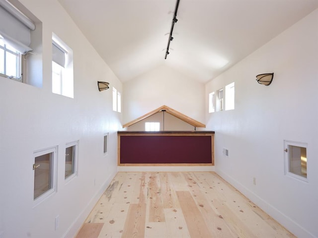 1918 Hopewell Unit C, Santa Fe, NM 87505 - additional living space featuring plenty of natural light, high vaulted ceiling, and wood finished floors