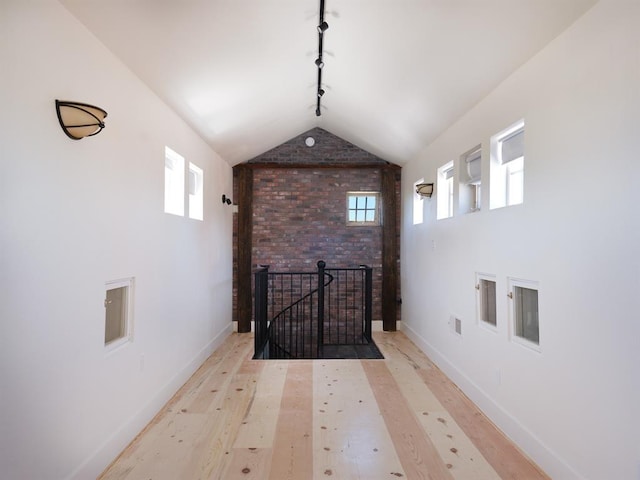 1918 Hopewell Unit C, Santa Fe, NM 87505 - additional living space featuring brick wall, lofted ceiling, and light wood-style floors
