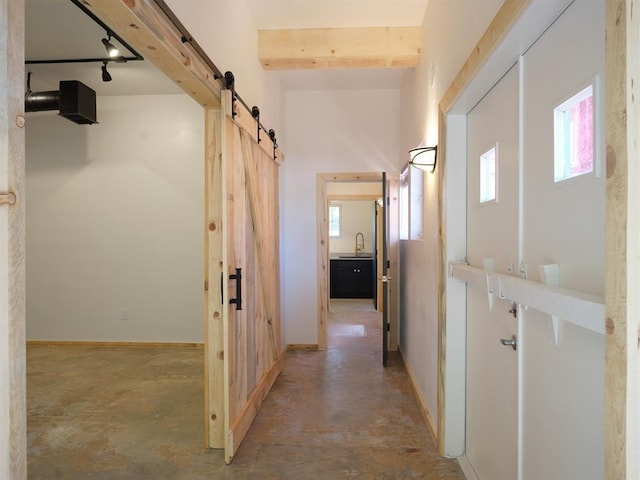 1918 Hopewell Unit C, Santa Fe, NM 87505 - hallway with a barn door and concrete floors