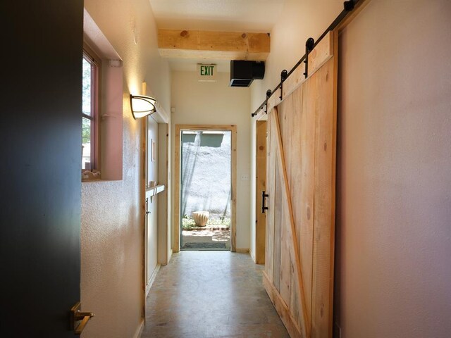 1918 Hopewell Unit C, Santa Fe, NM 87505 - hall featuring a barn door, beam ceiling, and concrete flooring