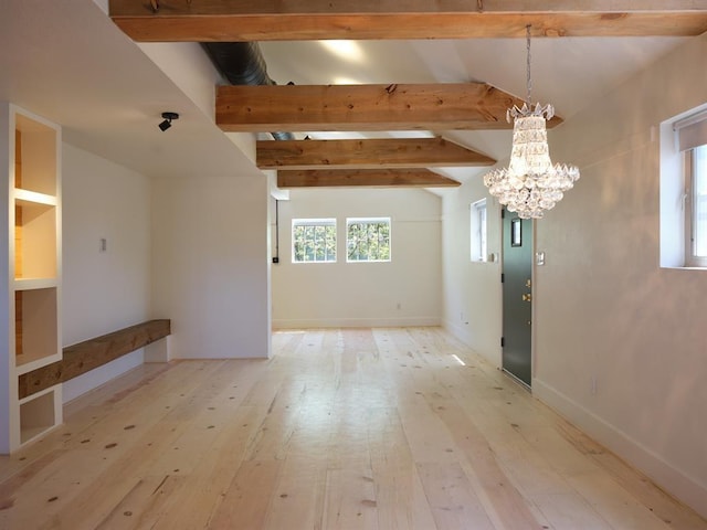 1918 Hopewell Unit C, Santa Fe, NM 87505 - unfurnished dining area featuring a chandelier and light wood-style floors