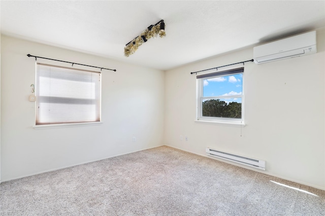 79 Moya Rd, Santa Fe, NM 87508 - carpeted empty room with baseboard heating and a wall mounted AC