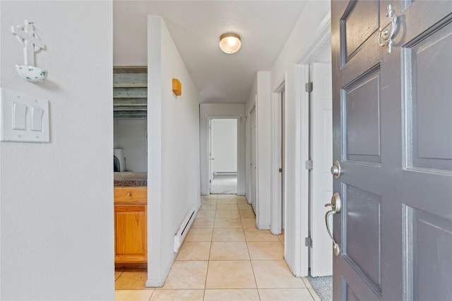79 Moya Rd, Santa Fe, NM 87508 - hall with a baseboard heating unit and light tile patterned floors