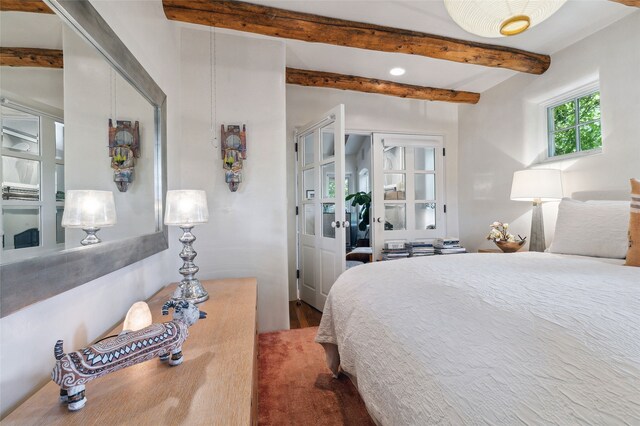 605 Acequia Madre, Santa Fe, NM 87505 - bedroom featuring beamed ceiling, wood finished floors, and recessed lighting