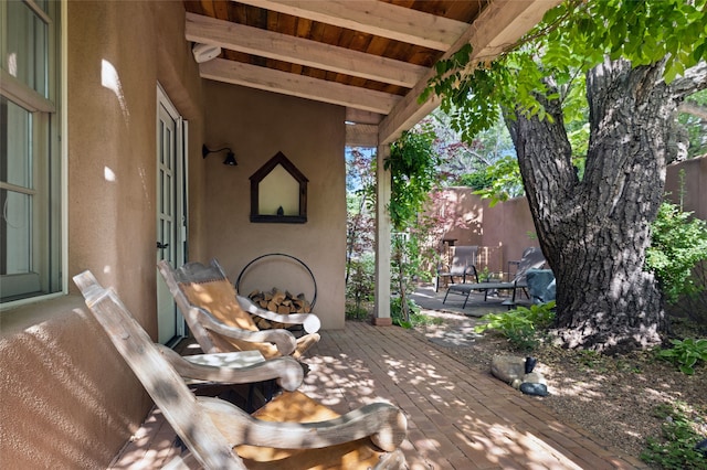 605 Acequia Madre, Santa Fe, NM 87505 - wooden deck with a patio