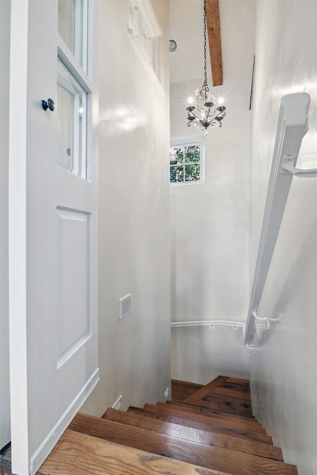 605 Acequia Madre, Santa Fe, NM 87505 - stairway featuring a chandelier and wood finished floors