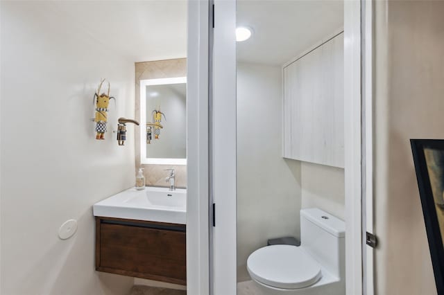 605 Acequia Madre, Santa Fe, NM 87505 - bathroom featuring vanity and toilet