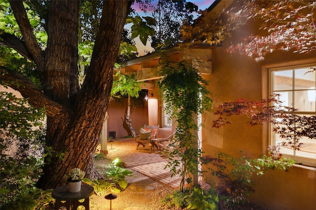 605 Acequia Madre, Santa Fe, NM 87505 - doorway to property with a patio