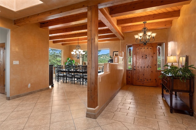 17 Sueno De Santa Fe, Santa Fe, NM 87505 - entryway featuring a chandelier and beam ceiling