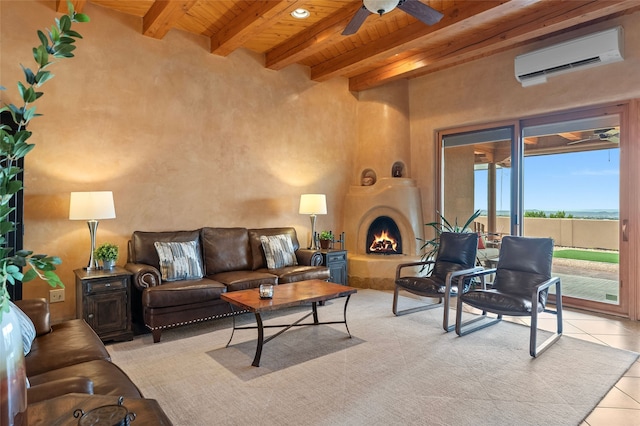 17 Sueno De Santa Fe, Santa Fe, NM 87505 - living area featuring an AC wall unit, a wooden ceiling with exposed beams, ceiling fan, light tile patterned flooring, and a large fireplace