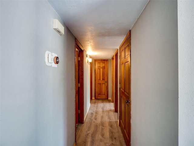 85 Chiquita Dr, White Rock, NM 87547 - hall with light wood-style flooring and baseboards