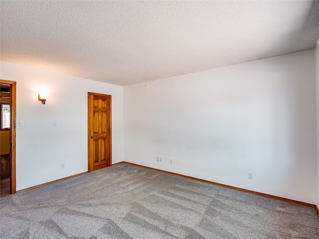 85 Chiquita Dr, White Rock, NM 87547 - empty room with carpet floors and a textured ceiling